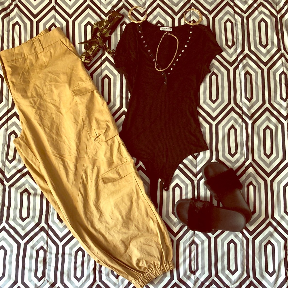 Item#1 :black thong leotard Item #2 :cargo pants